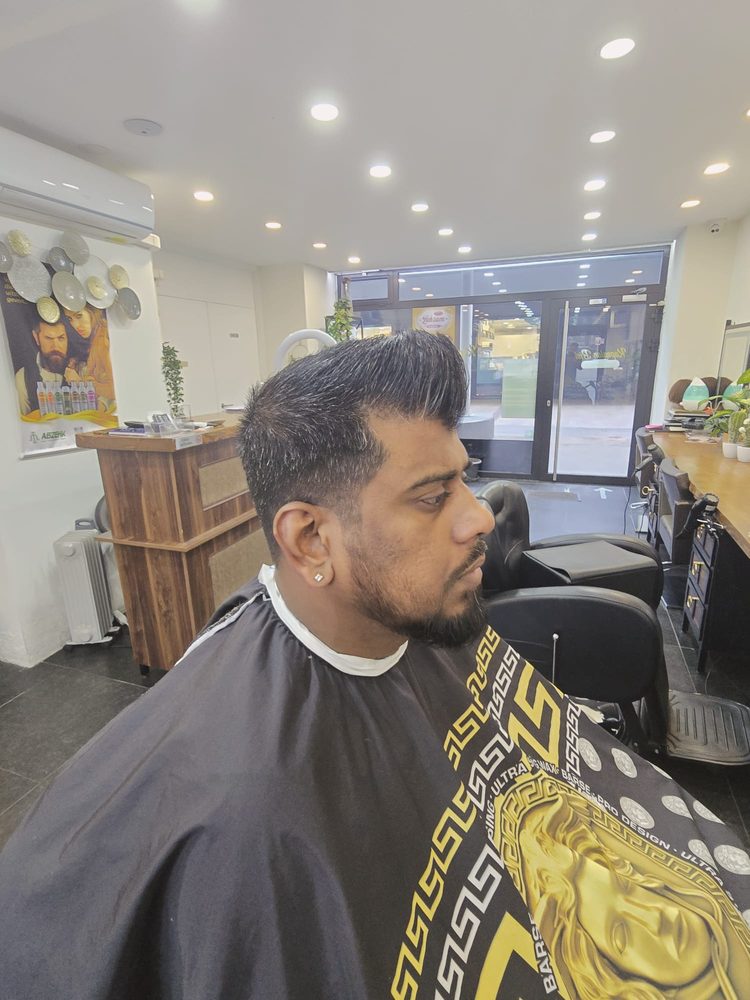 Herenkapsel slick back met fade — Kapsalon Bist Wilrijk